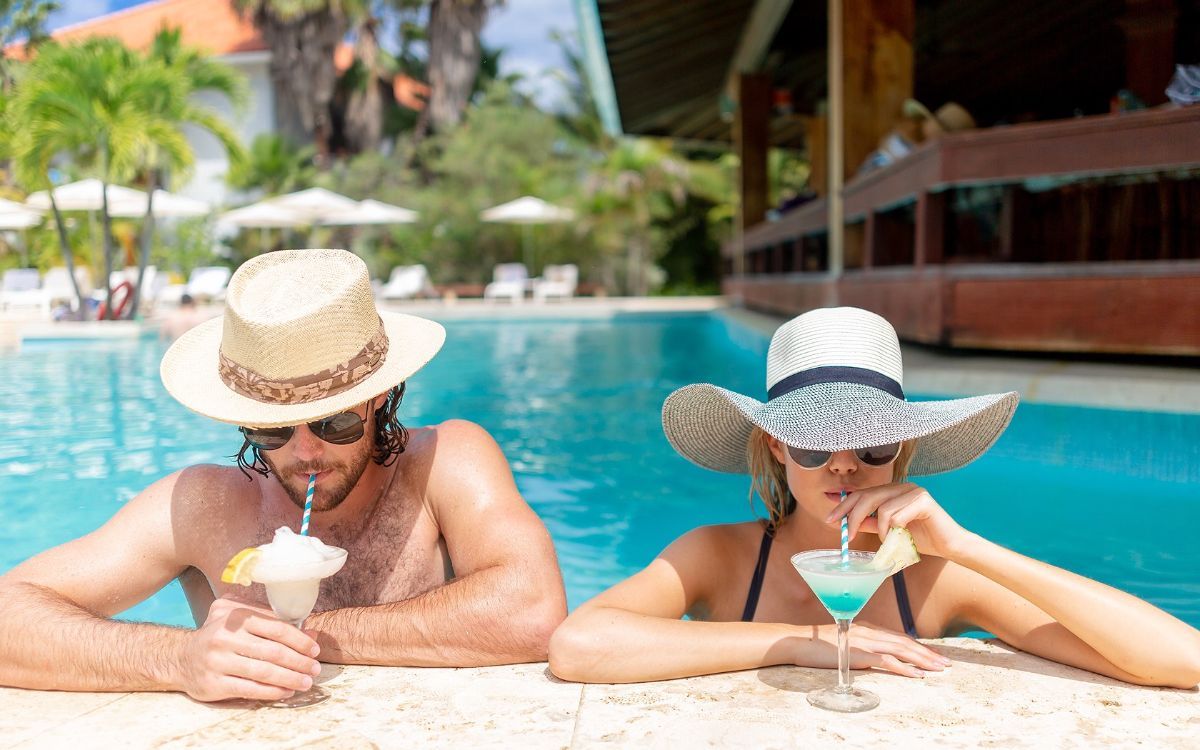 Couple Enjoy Drink at Pool